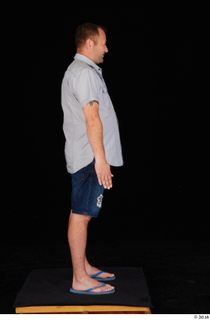 Louis blue shirt casual dressed flip flop jeans shorts standing…